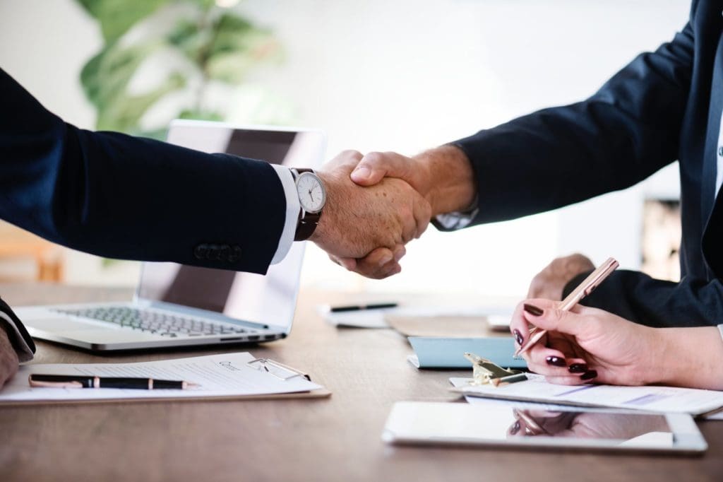 Professionals collaborating around a table